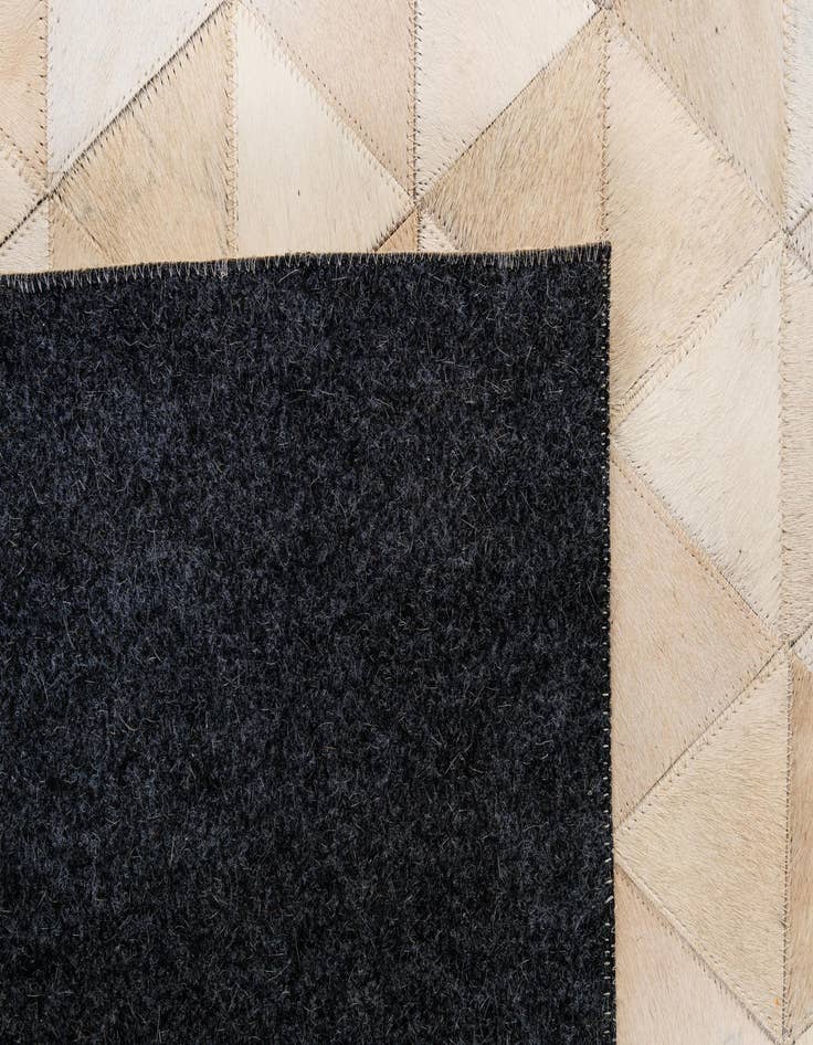 Detail image of  5' 2 x 8' 2 Cowhide - Patchwork Rug