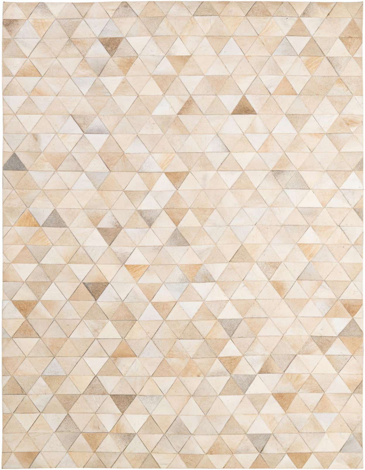 A 5x8 rectangular cowhide rug featuring a modern geometric patchwork of ivory and cream triangular leather pieces.