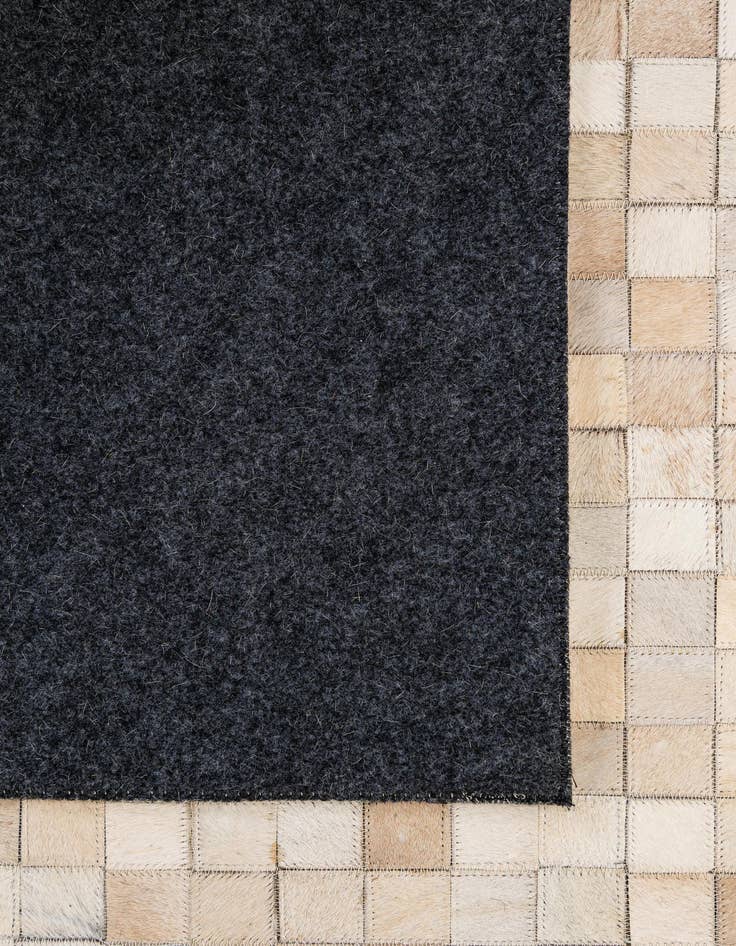 Detail image of  5' 1 x 8' 1 Cowhide - Patchwork Rug