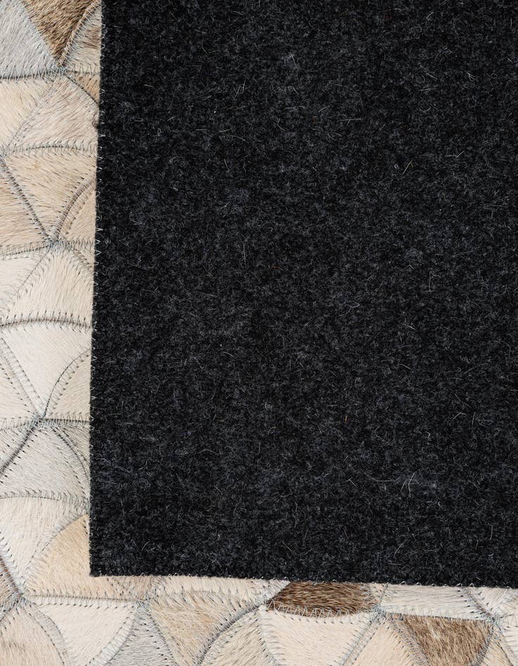 Detail image of  4' 11 x 7' 11 Cowhide - Patchwork Rug