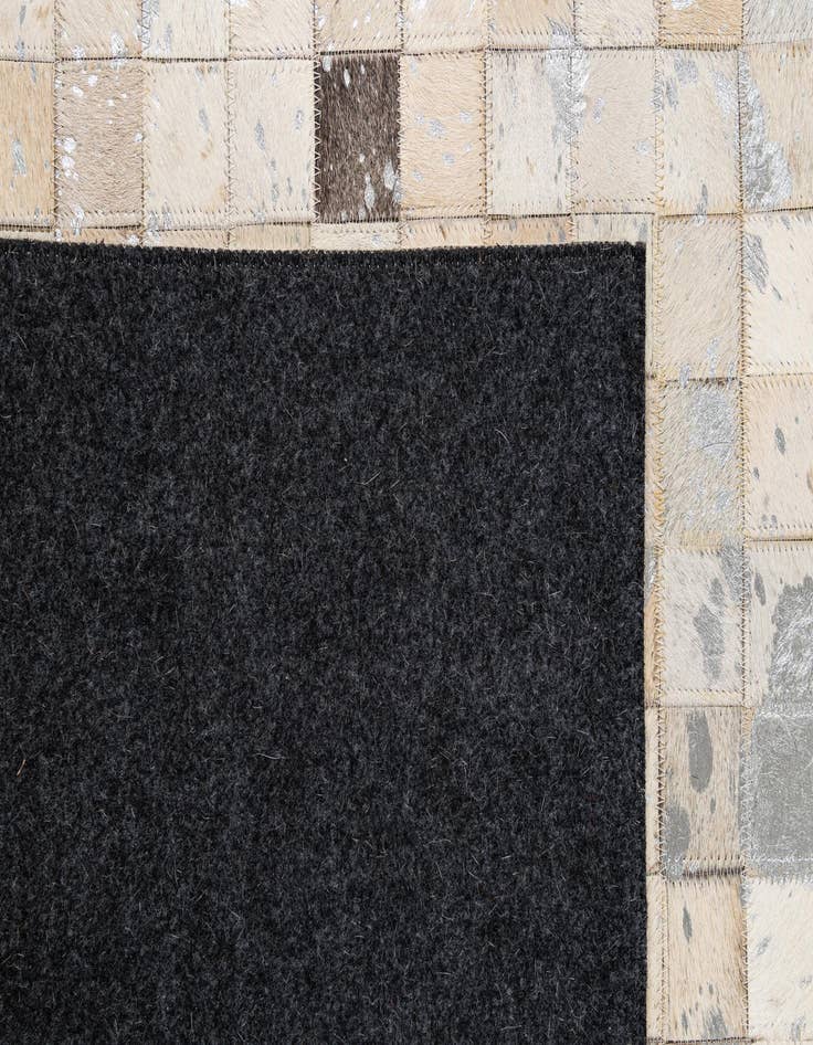 Detail image of  5' 1 x 8' Cowhide - Patchwork Rug