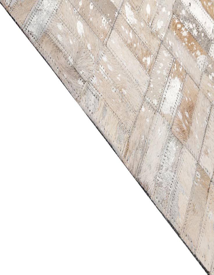 Detail image of  4' 11 x 8' Cowhide - Patchwork Rug