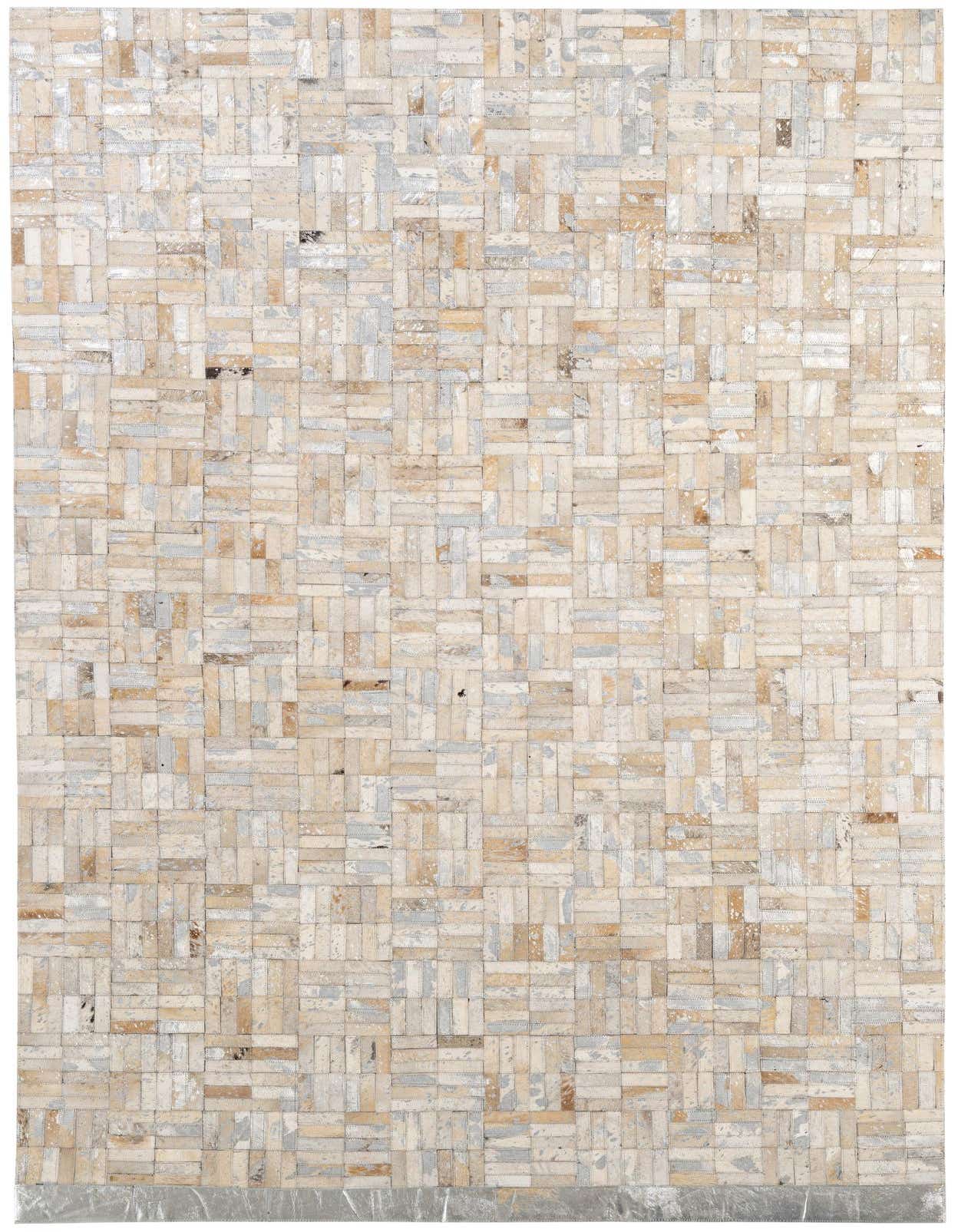 A 5x8 rectangular ivory cowhide patchwork rug featuring a modern striped pattern, perfect for a living room.