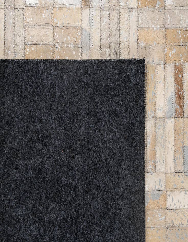 Detail image of  4' 11 x 7' 9 Cowhide - Patchwork Rug