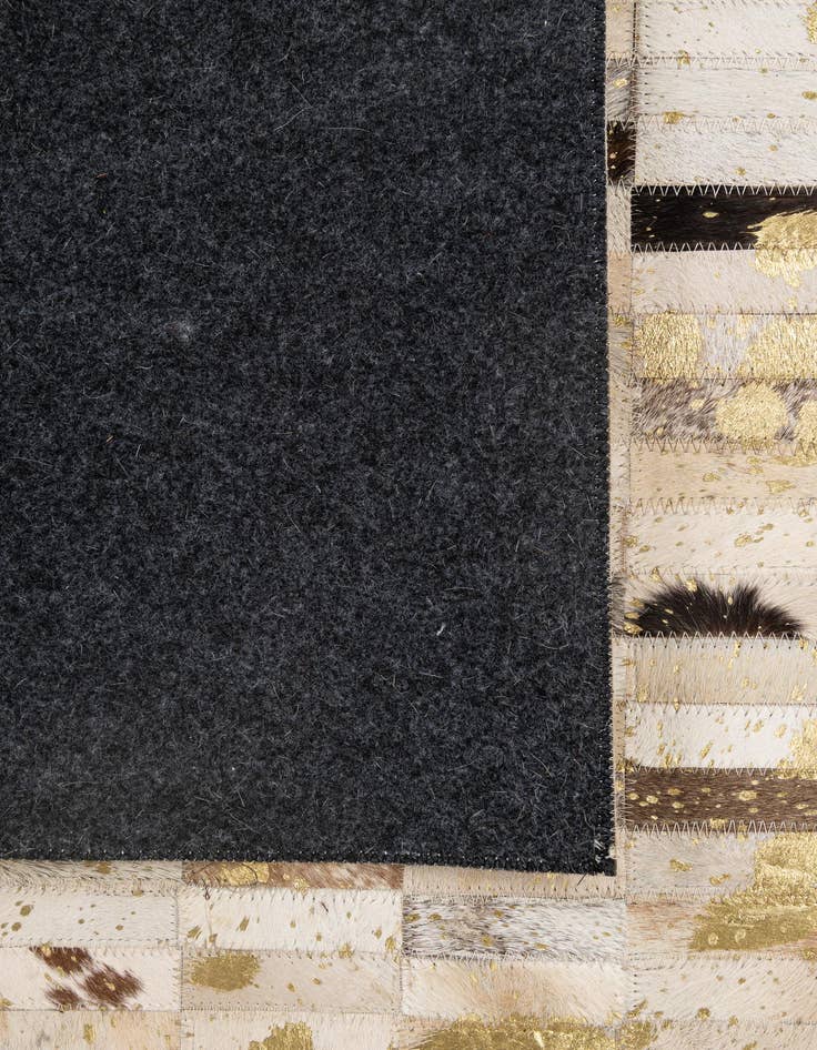 Detail image of  4' 11 x 7' 11 Cowhide - Patchwork Rug