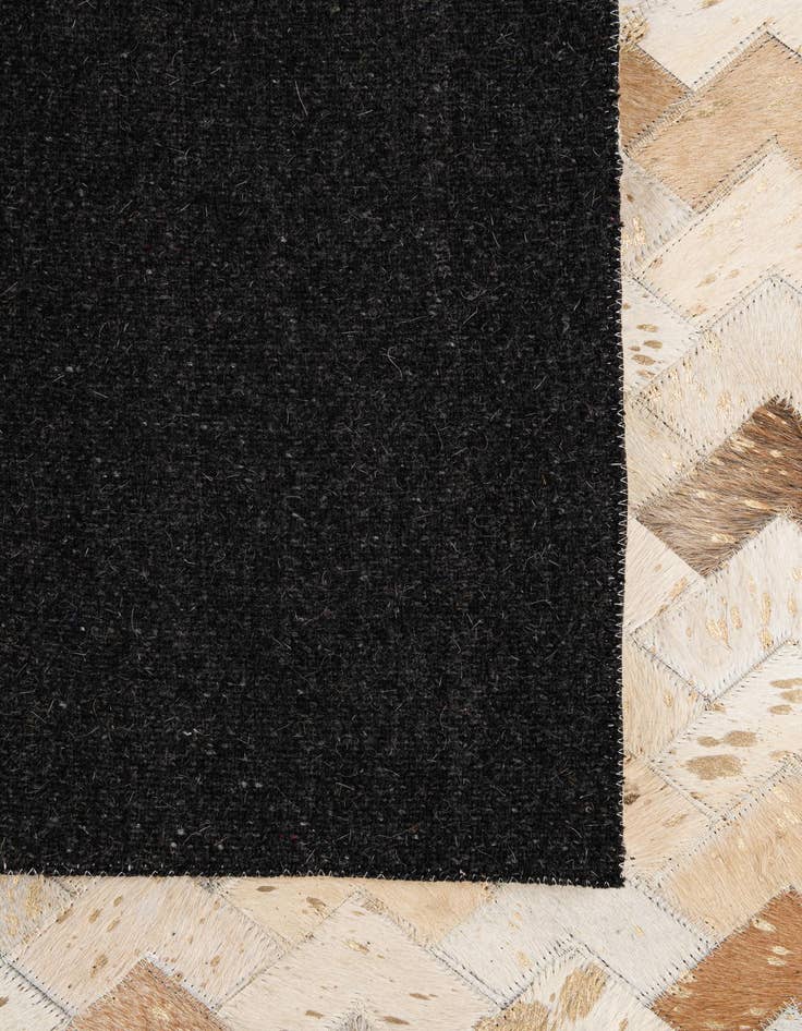 Detail image of  5' 3 x 8' 1 Cowhide - Patchwork Rug