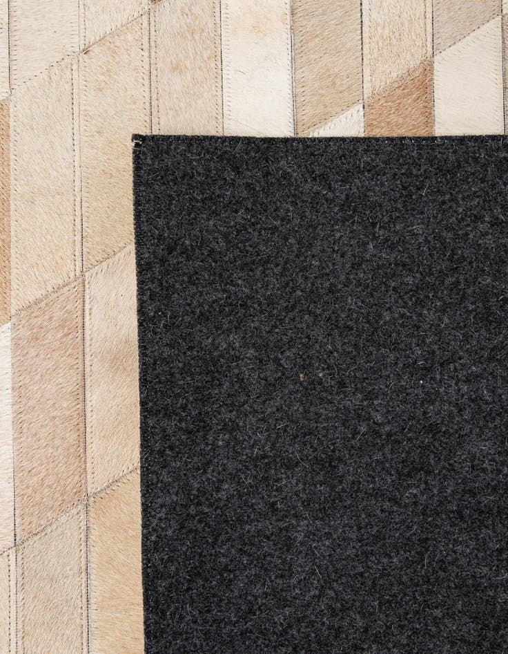 Detail image of  5' 1 x 7' 11 Cowhide - Patchwork Rug
