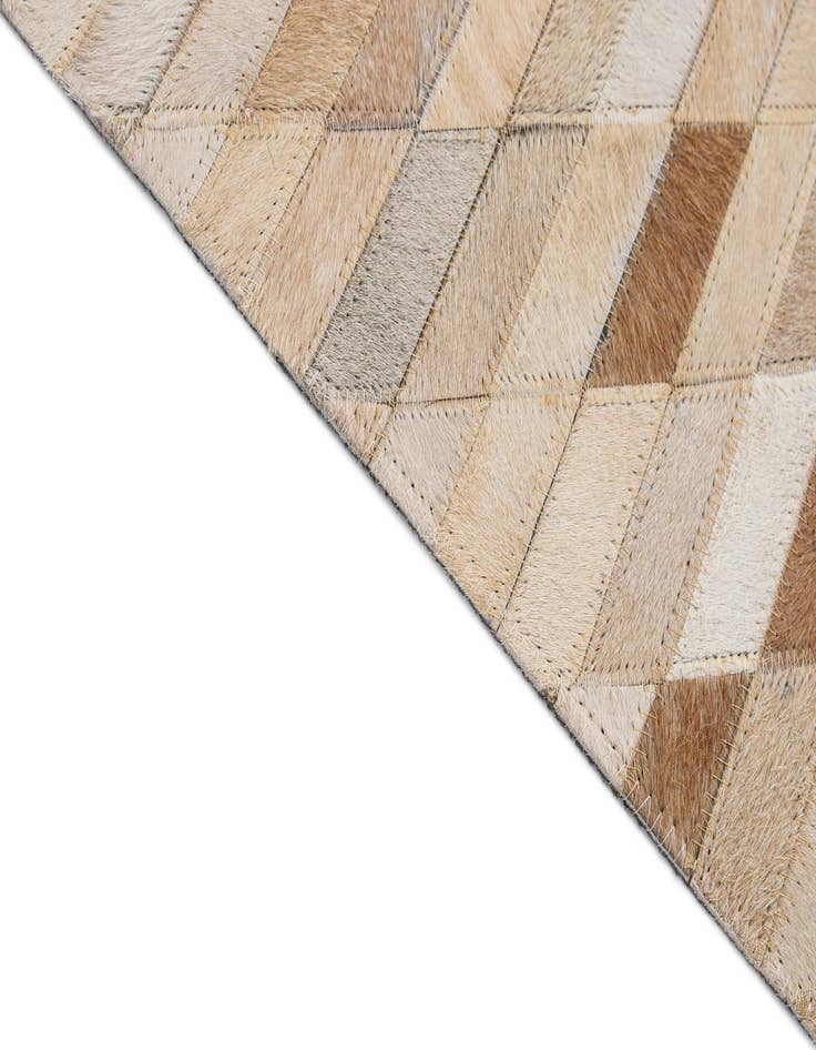 Detail image of  5' 1 x 7' 11 Cowhide - Patchwork Rug