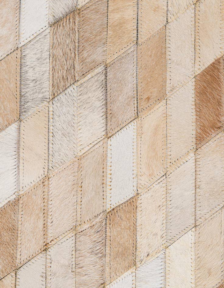 Detail image of  5' 1 x 7' 11 Cowhide - Patchwork Rug