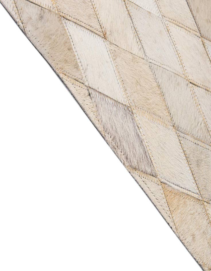 Detail image of  5' 1 x 8' 2 Cowhide - Patchwork Rug