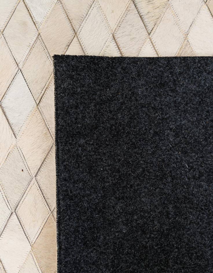 Detail image of  5' 1 x 8' 2 Cowhide - Patchwork Rug