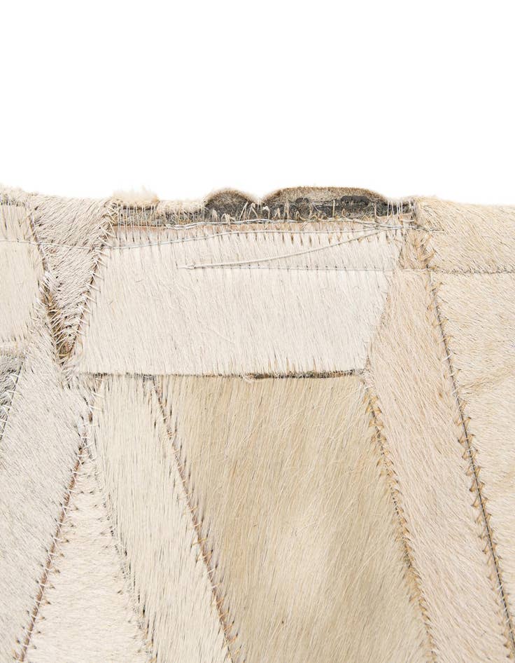 Detail image of  5' 1 x 7' 11 Cowhide - Patchwork Rug