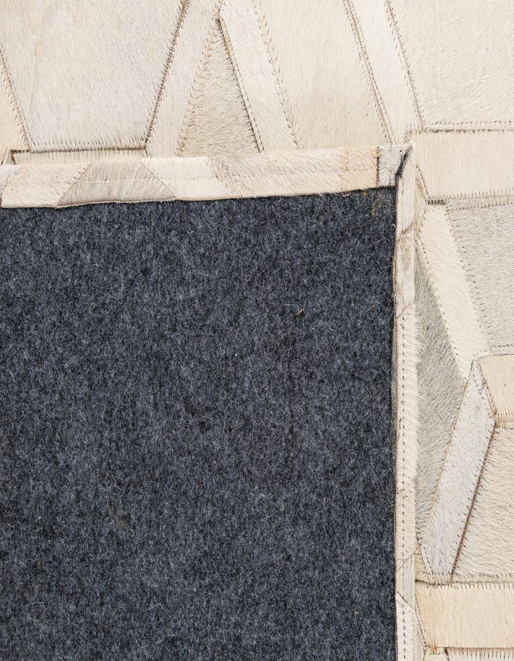 Detail image of  4' 11 x 7' 11 Cowhide - Patchwork Rug