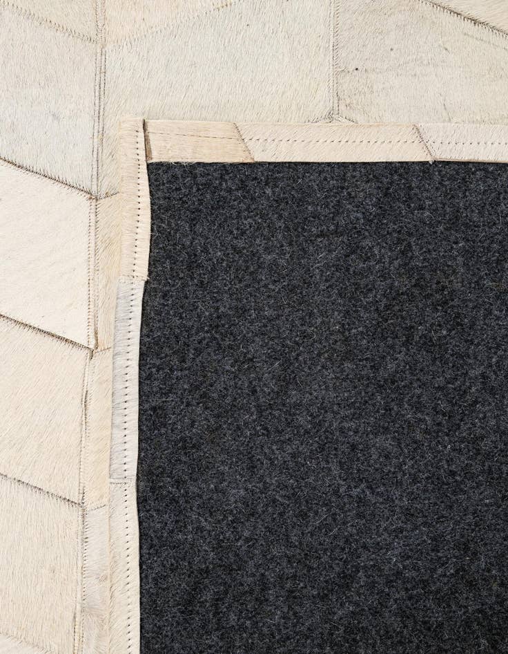 Detail image of  5' 1 x 8' Cowhide - Patchwork Rug