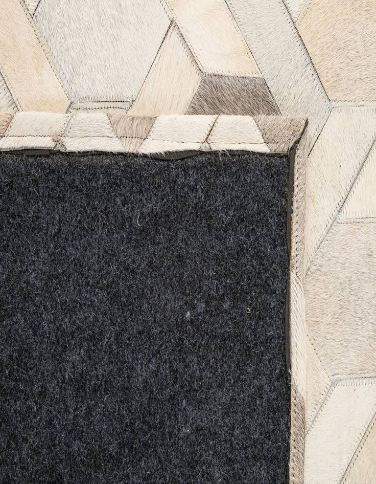 Detail image of  4' 11 x 8' 1 Cowhide - Patchwork Rug