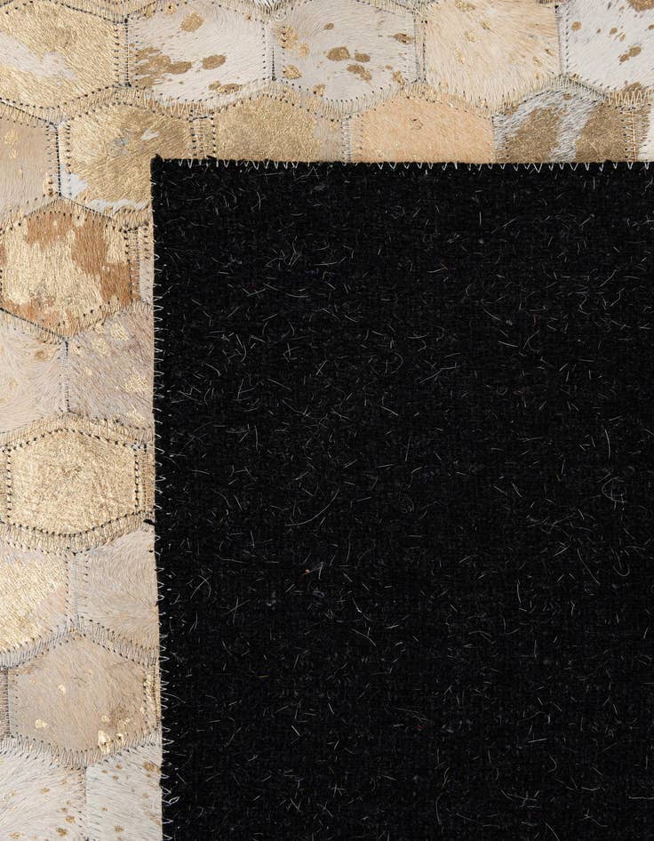 Detail image of  5' 1 x 7' 11 Cowhide - Patchwork Rug