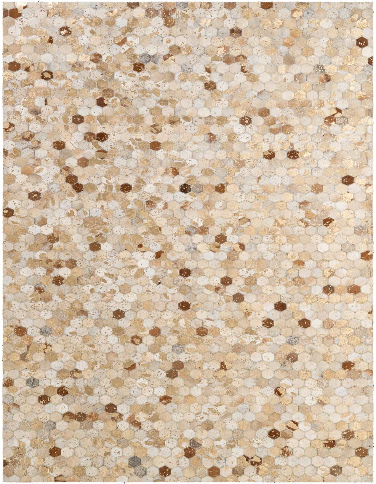 A rectangular 5x8 modern patchwork cowhide rug with ivory, cream, and brown hexagonal tiles, featuring metallic gold accents.