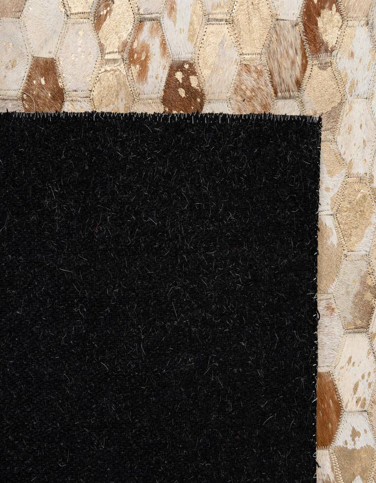Detail image of  5' 1 x 8' 1 Cowhide - Patchwork Rug
