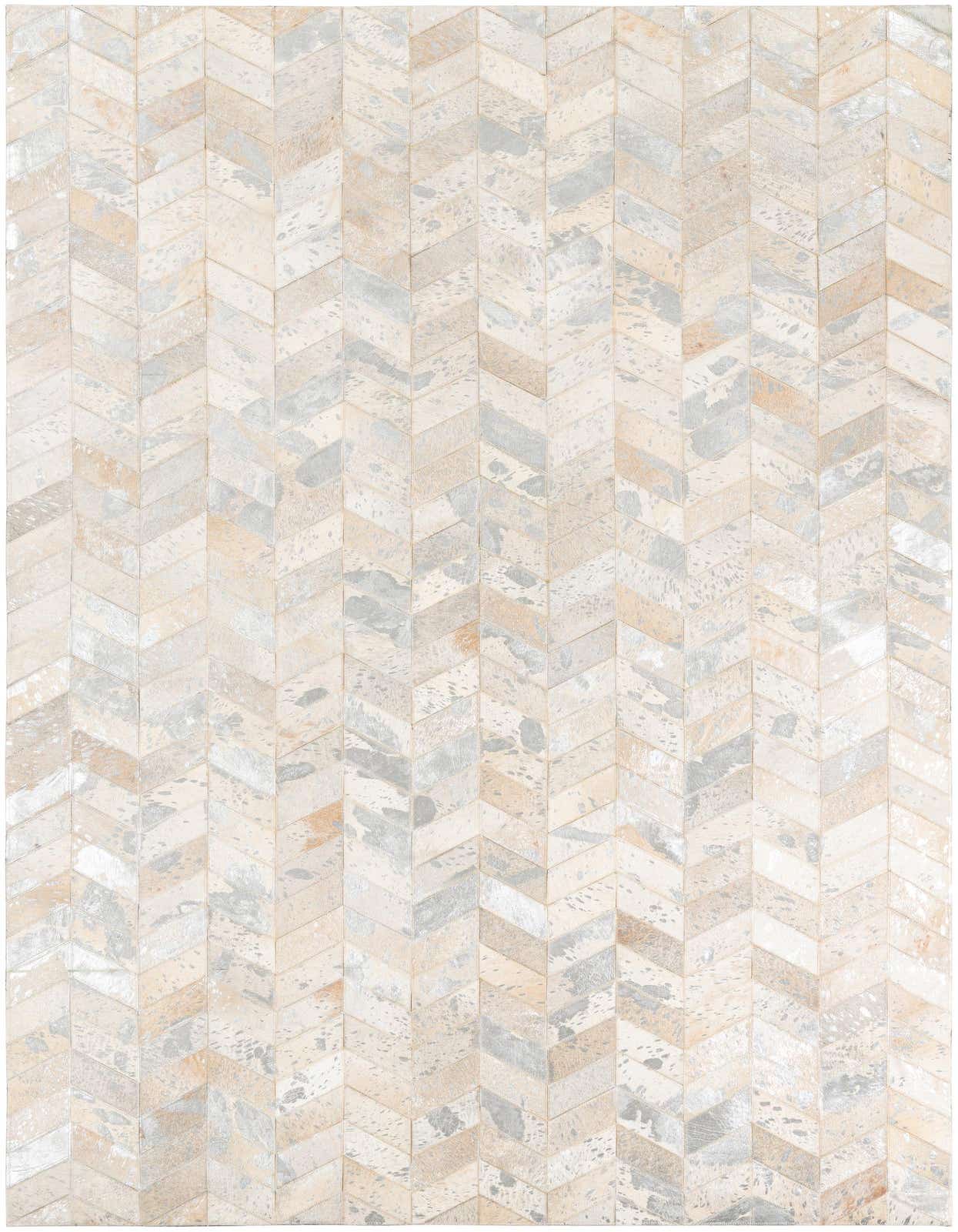 A rectangular 5x8 ivory and cream cowhide leather rug with a modern chevron pattern.