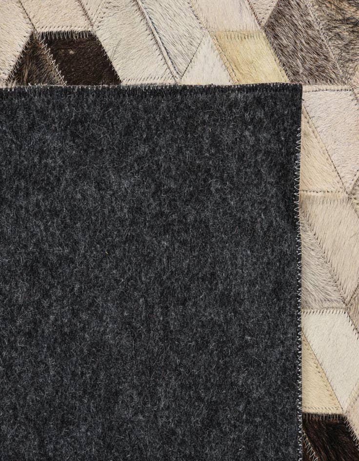 Detail image of  5' 3 x 7' 6 Cowhide Rug