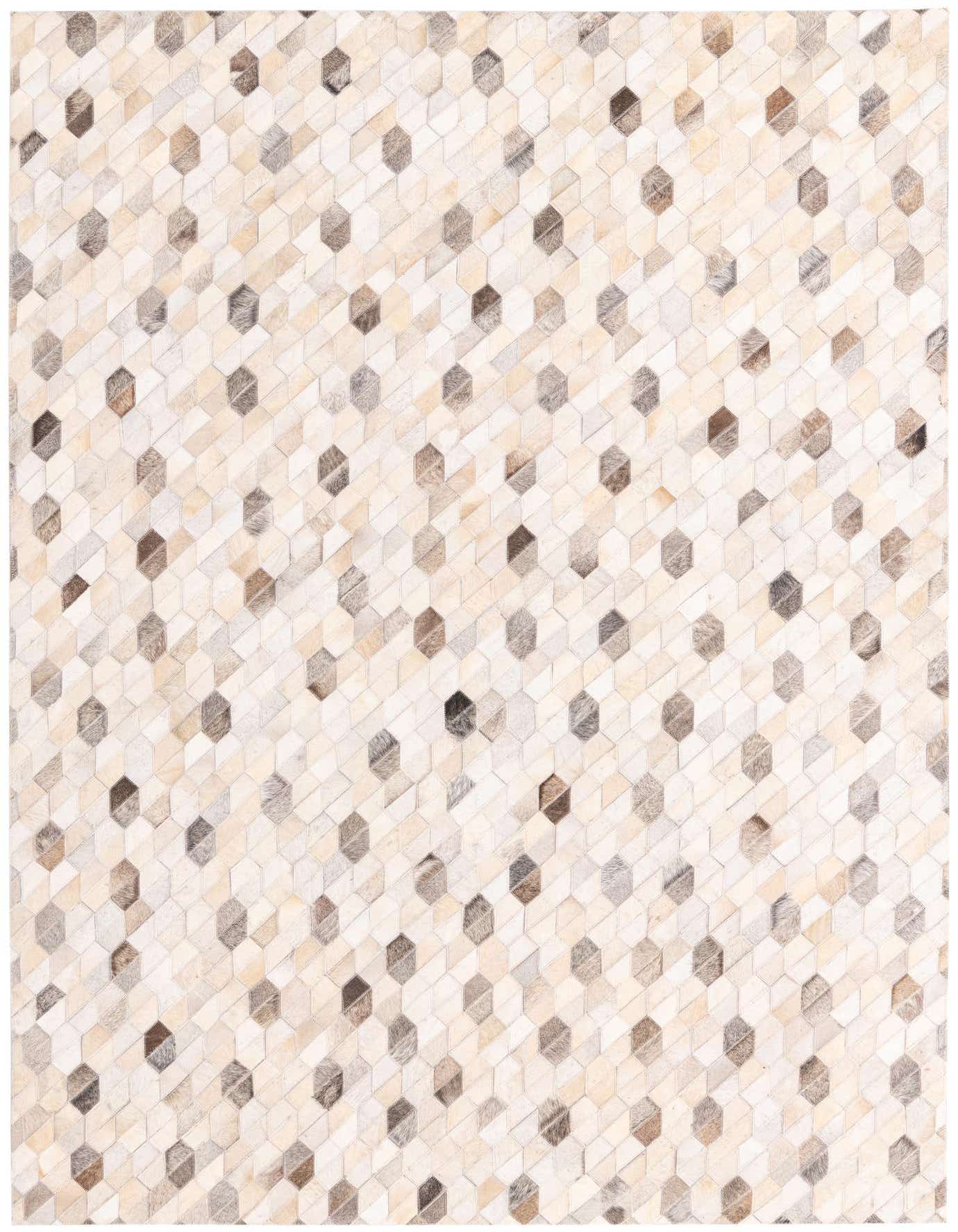 A 5x8 rectangular Cowhide rug in Ivories and Creams, featuring a modern geometric pattern of light and dark hexagonal patches.