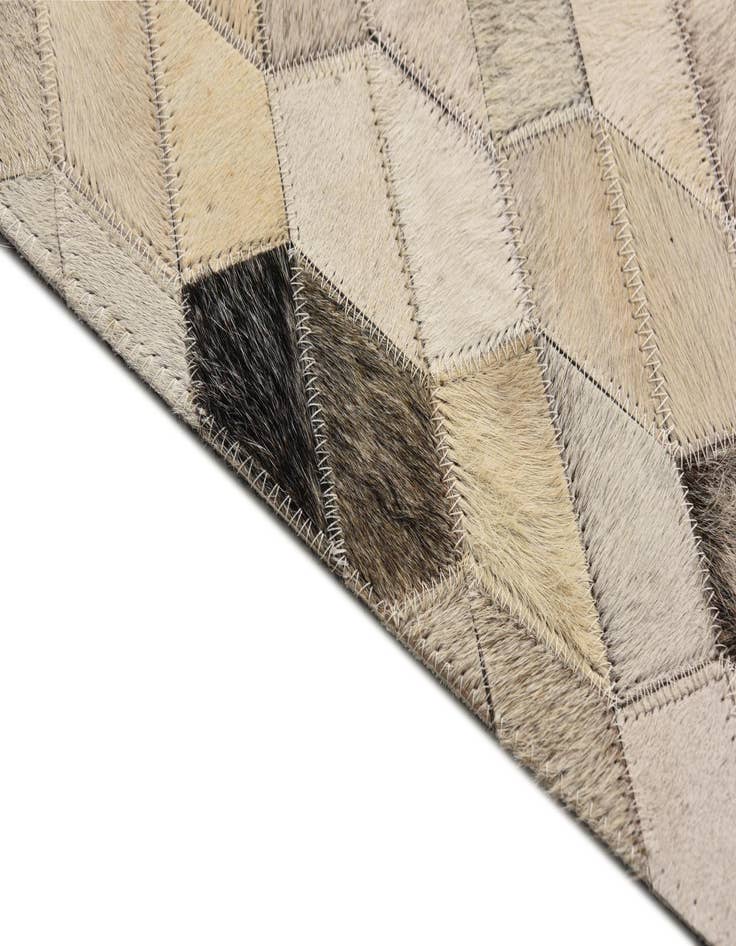 Detail image of  5' 3 x 7' 8 Cowhide Rug