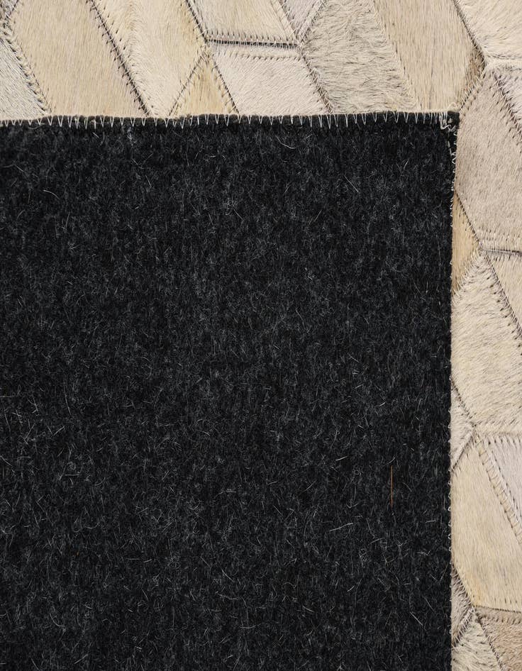 Detail image of  5' 3 x 7' 8 Cowhide Rug
