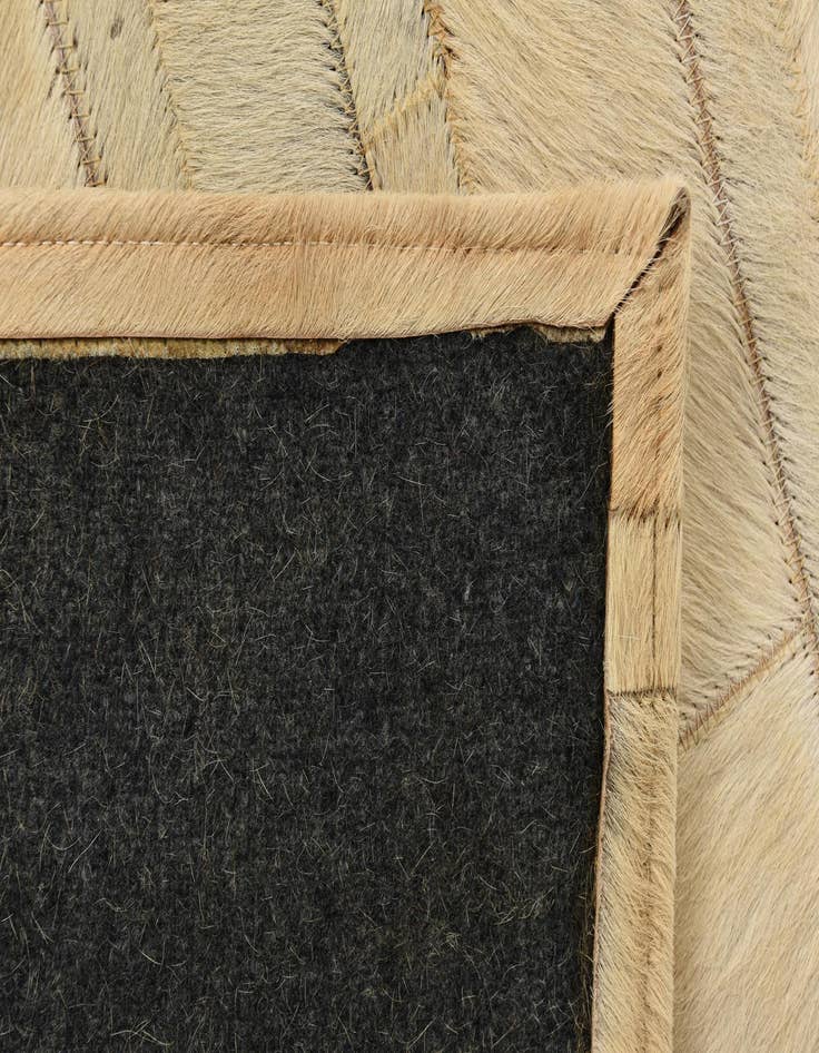 Detail image of  2' 1 x 3' Cowhide Rug