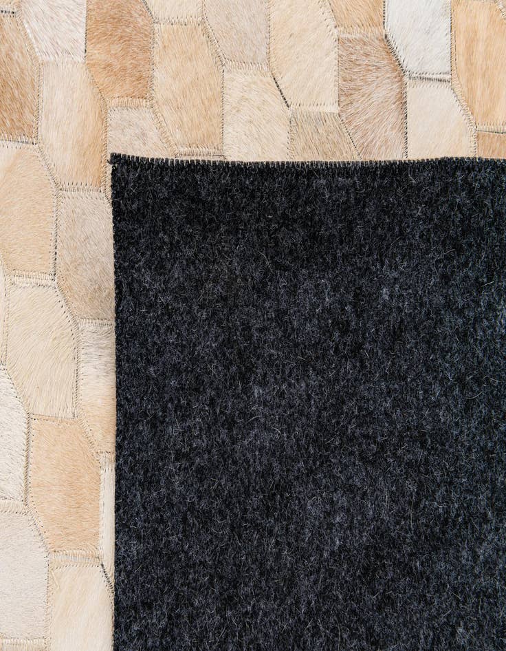 Detail image of  6' 8 x 10' Cowhide Stocks Rug