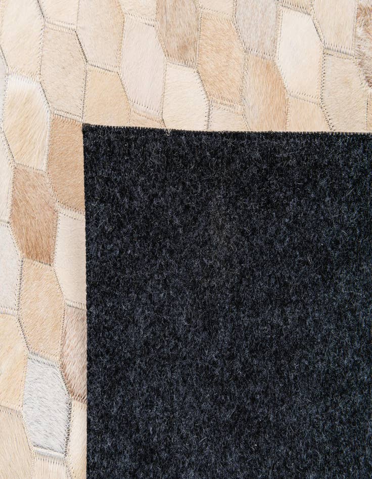 Detail image of  6' 8 x 10' 1 Cowhide Stocks Rug