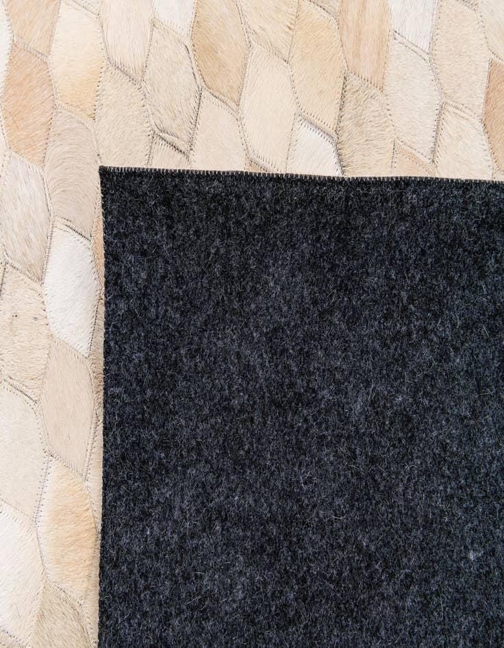 Detail image of  6' 9 x 9' 11 Cowhide Stocks Rug