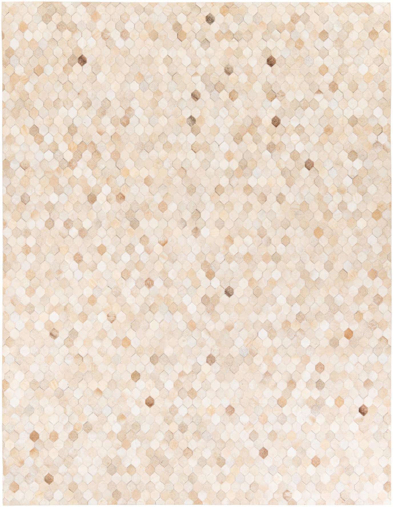 A 7x10 rectangular Cowhide Stocks rug in varying shades of ivory and cream, featuring a modern geometric pattern of small, irregularly shaped hexagonal patches.