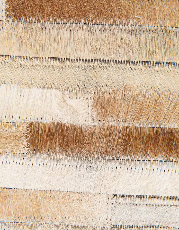 Detail image of  5' 1 x 7' 11 Cowhide Stocks Rug