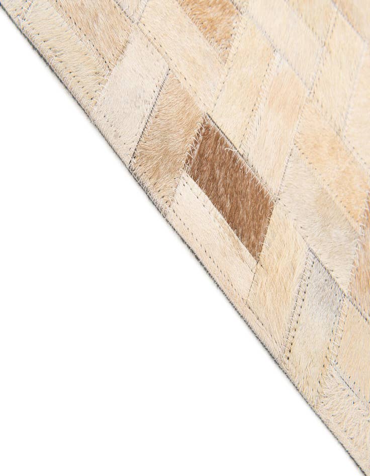 Detail image of  5' 3 x 7' 5 Cowhide Stocks Rug