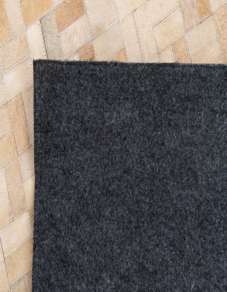 Detail image of  5' 3 x 7' 5 Cowhide Stocks Rug