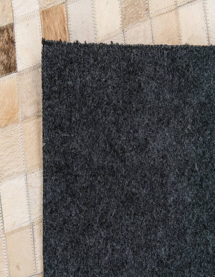 Detail image of  5' 1 x 7' 11 Cowhide Stocks Rug