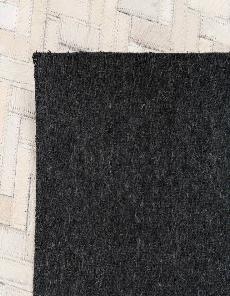 Detail image of  4' 10 x 7' 7 Cowhide Stocks Rug