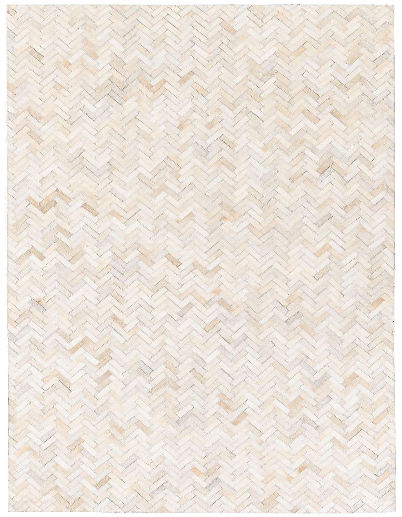 A 5x8 rectangular Cowhide Stocks rug in a modern herringbone pattern with varied ivory and cream tones.