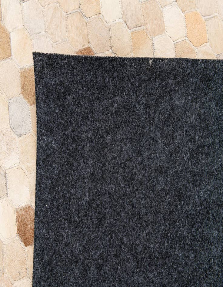 Detail image of  5' 7 x 8' Cowhide Stocks Rug