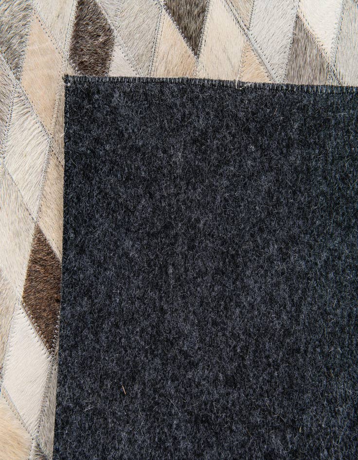 Detail image of  5' 8 x 7' 9 Cowhide Stocks Rug