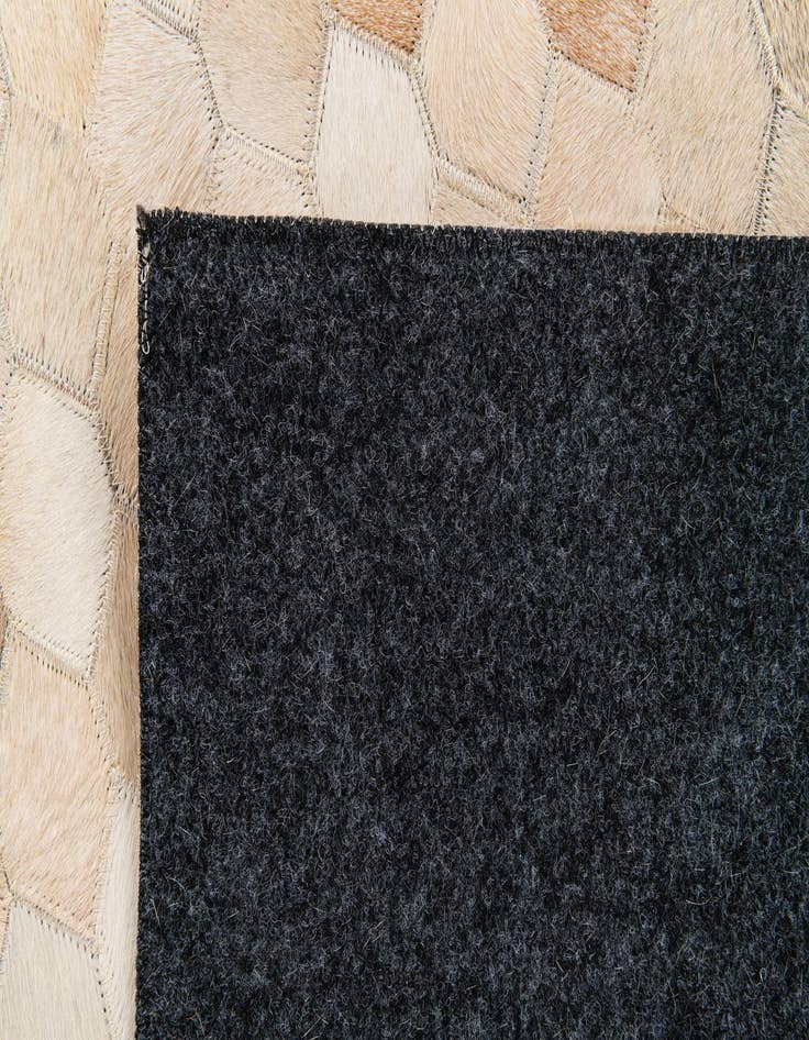 Detail image of  5' 7 x 7' 11 Cowhide Stocks Rug