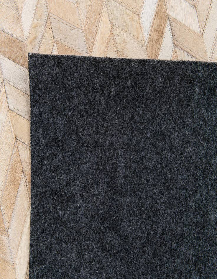 Detail image of  5' 1 x 8' Cowhide Stocks Rug