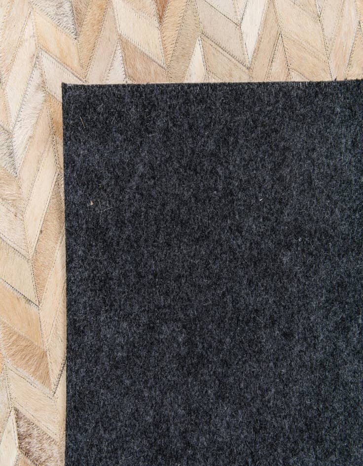 Detail image of  5' 1 x 8' Cowhide Stocks Rug