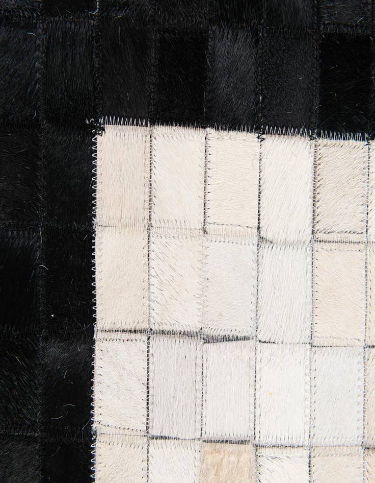 Detail image of  5' 1 x 8' Cowhide Stocks Rug