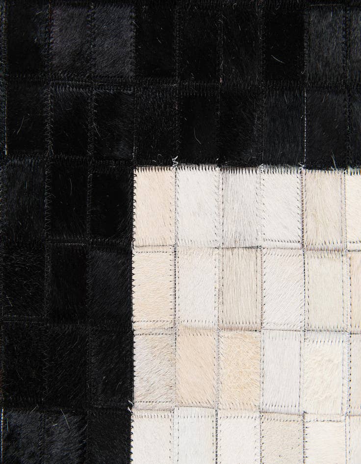 Detail image of  5' 2 x 8' 1 Cowhide Stocks Rug