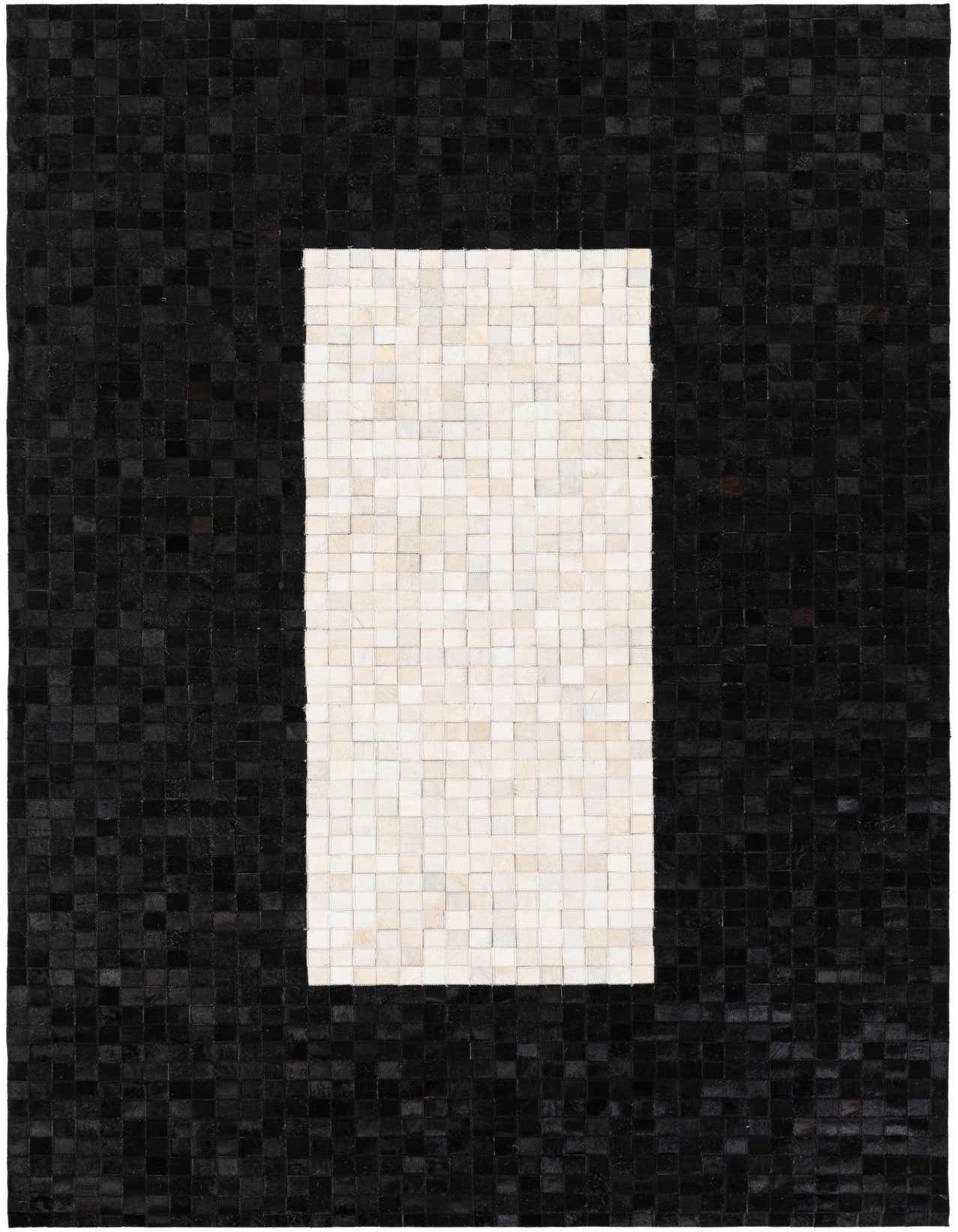 A modern 5x8 rectangular rug featuring a bold black and ivory color block design made from cowhide squares.