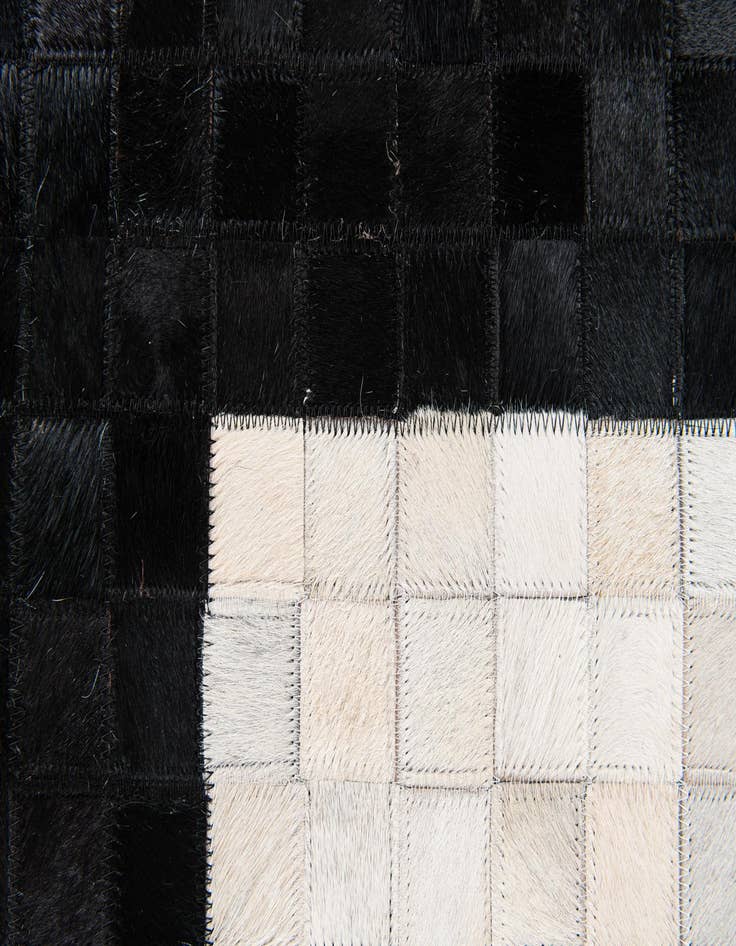 Detail image of  4' 11 x 8' Cowhide Stocks Rug