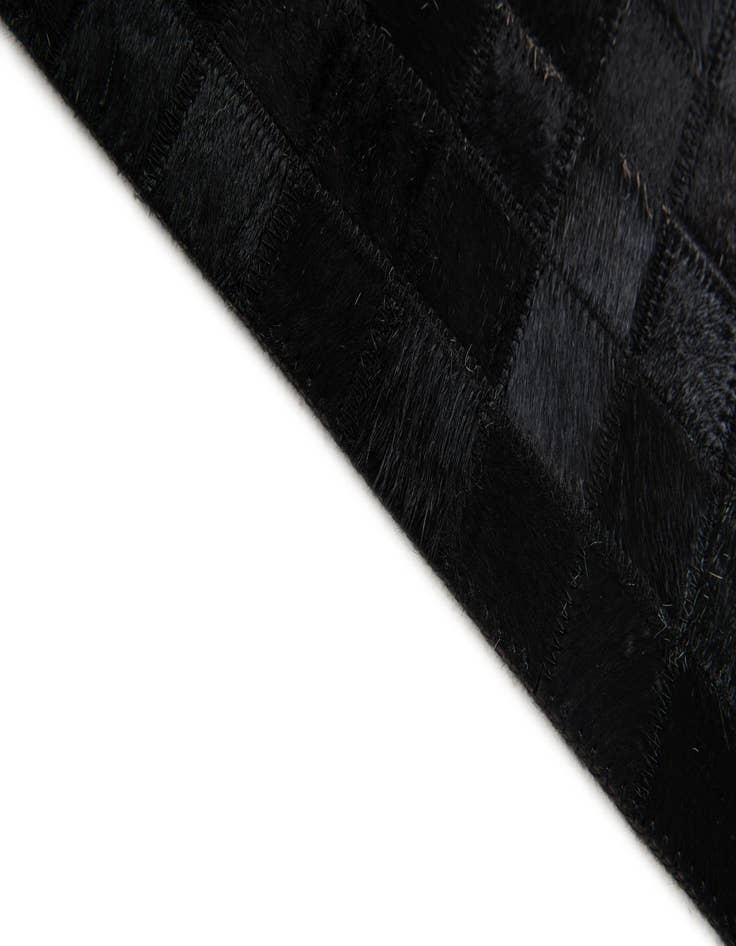 Detail image of  5' 1 x 7' 10 Cowhide Stocks Rug