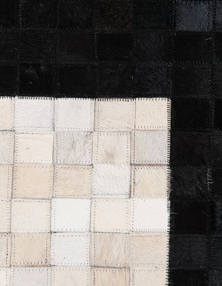 Detail image of  5' 1 x 7' 10 Cowhide Stocks Rug