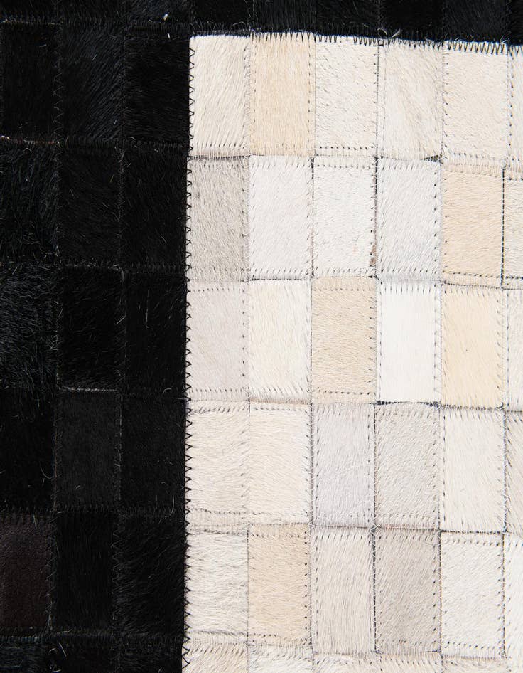 Detail image of  5' 1 x 8' 1 Cowhide Stocks Rug